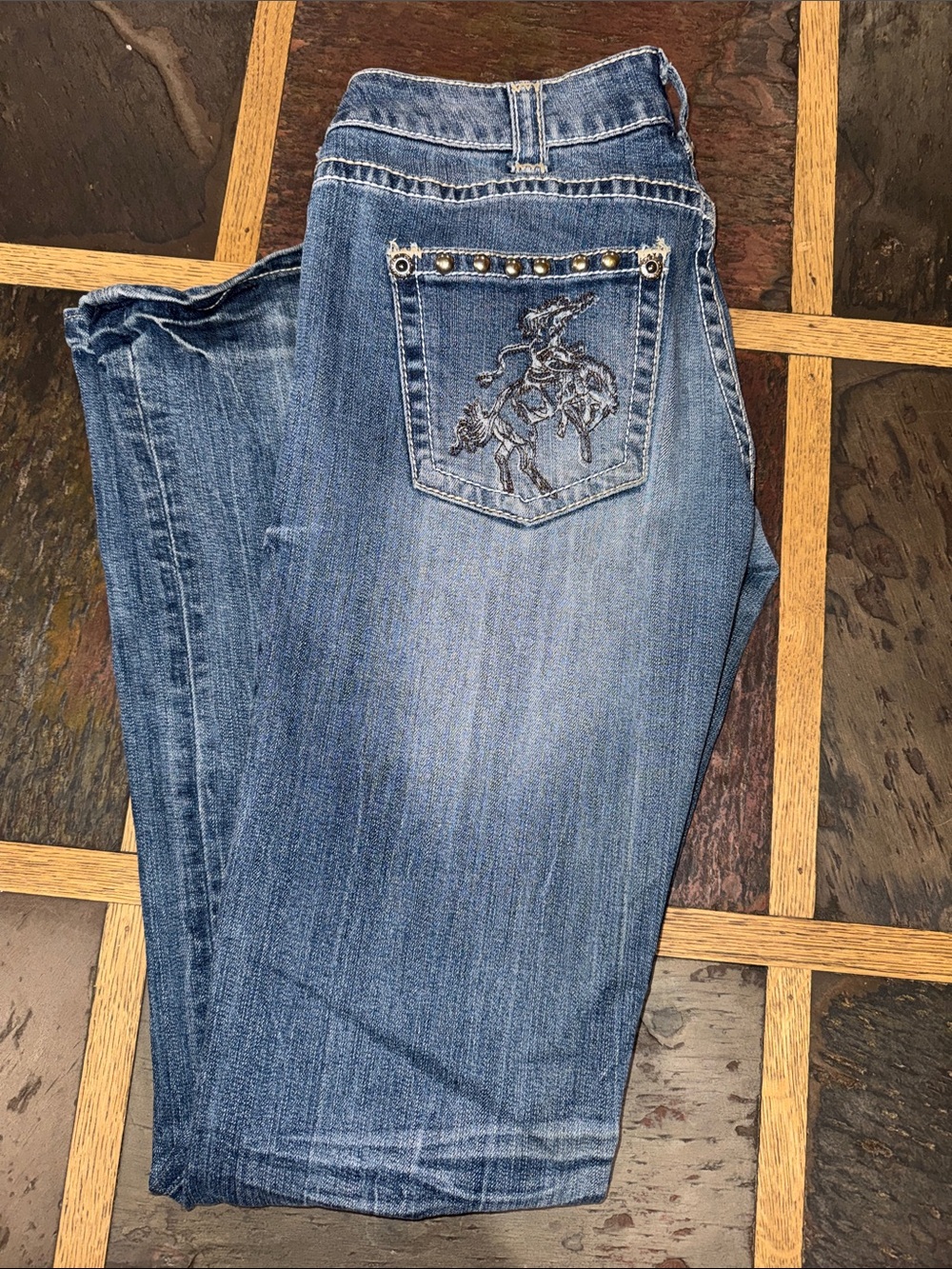 Cowgirl Tuff Women's Blue Bootcut Jeans with Embroidered Rodeo Pocket